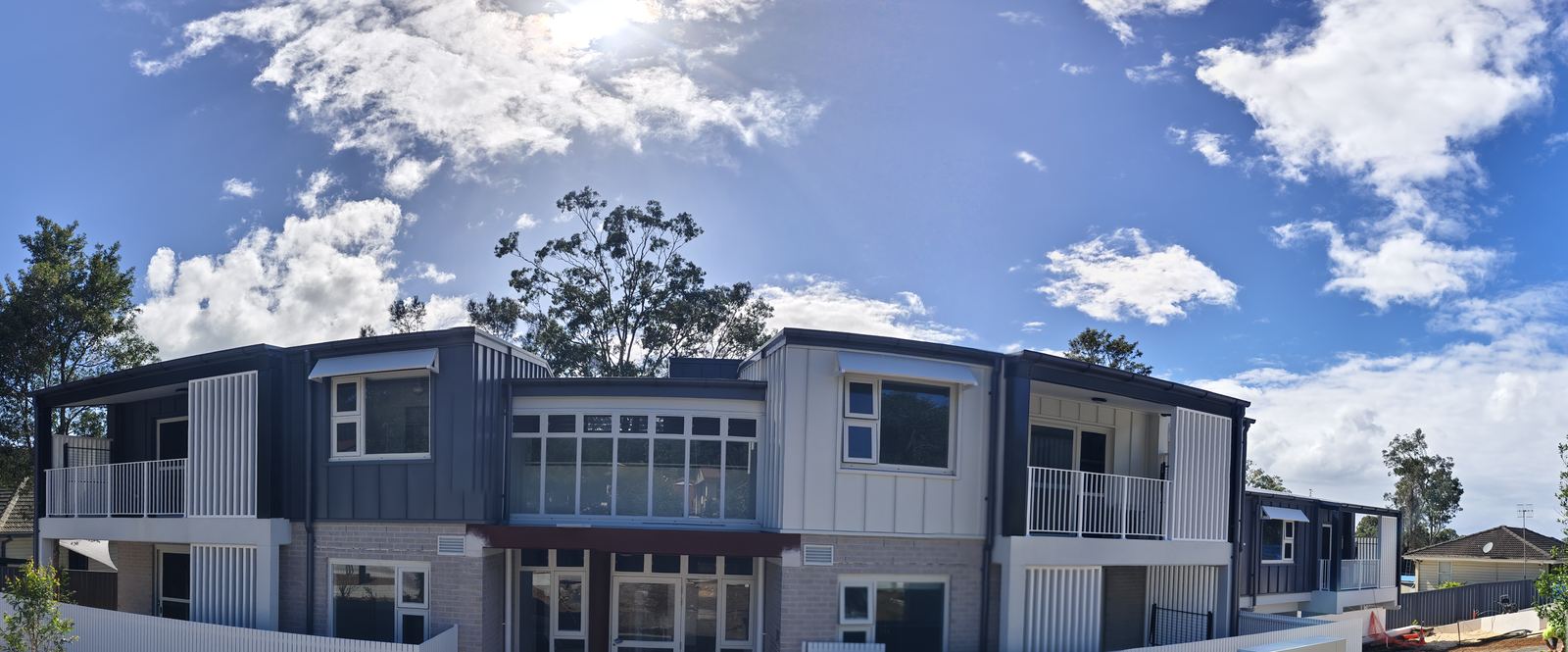 Townhouse development in Wyong NSW with white-framed windows